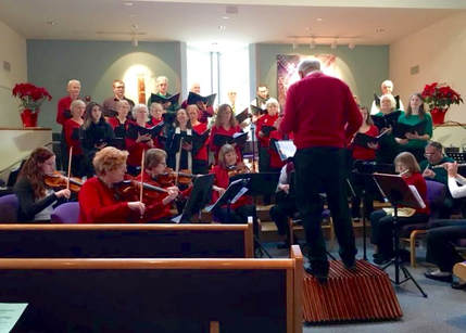 Music Director Glenn Mehrbach leads the Community Church Choir in the holiday performance of Bach's 